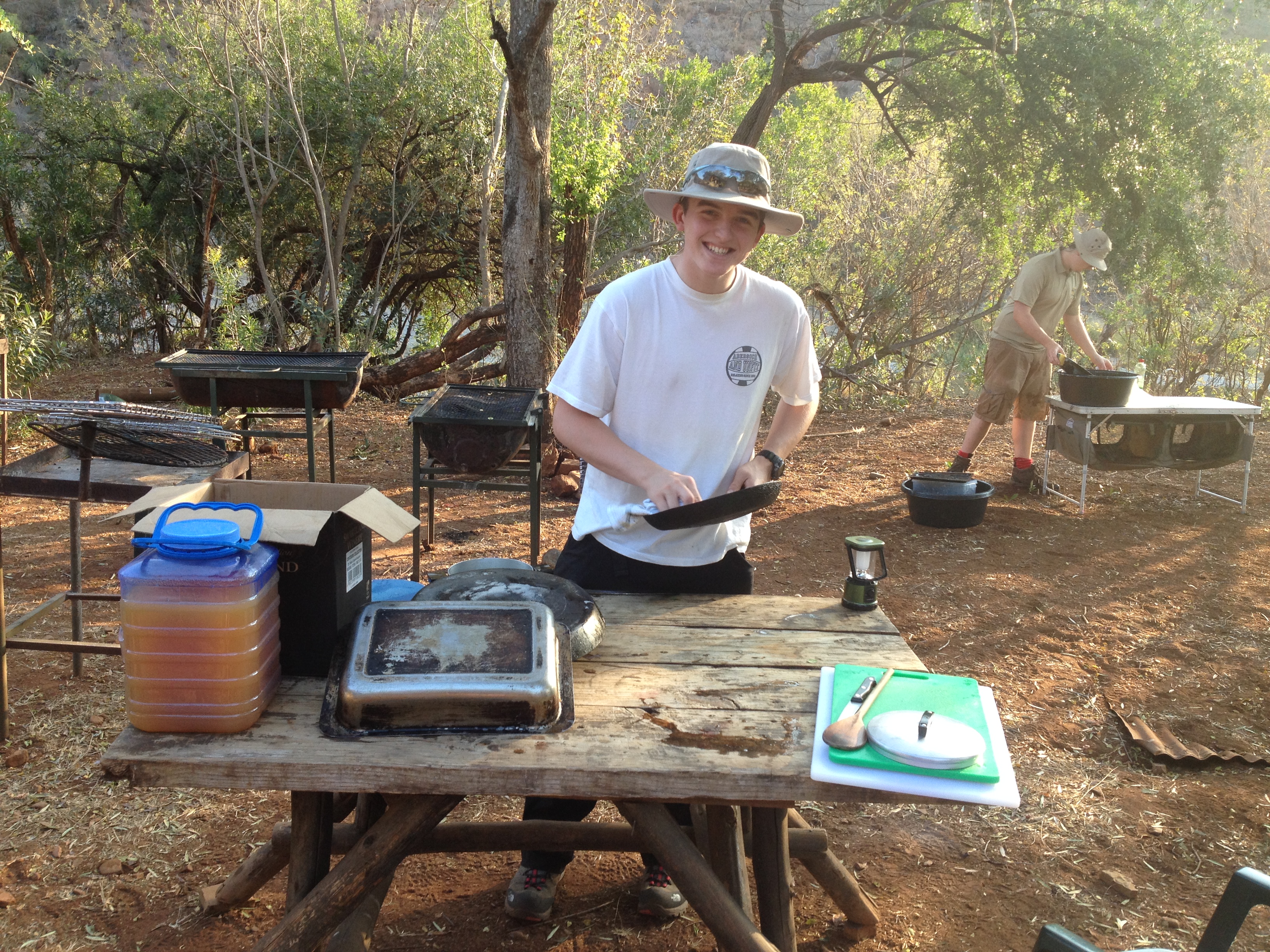 Archie Parker and Todd Cross-Watson getting to grips with the washing up in Ithala